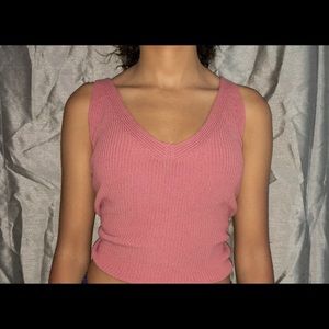 A pink knit tank top